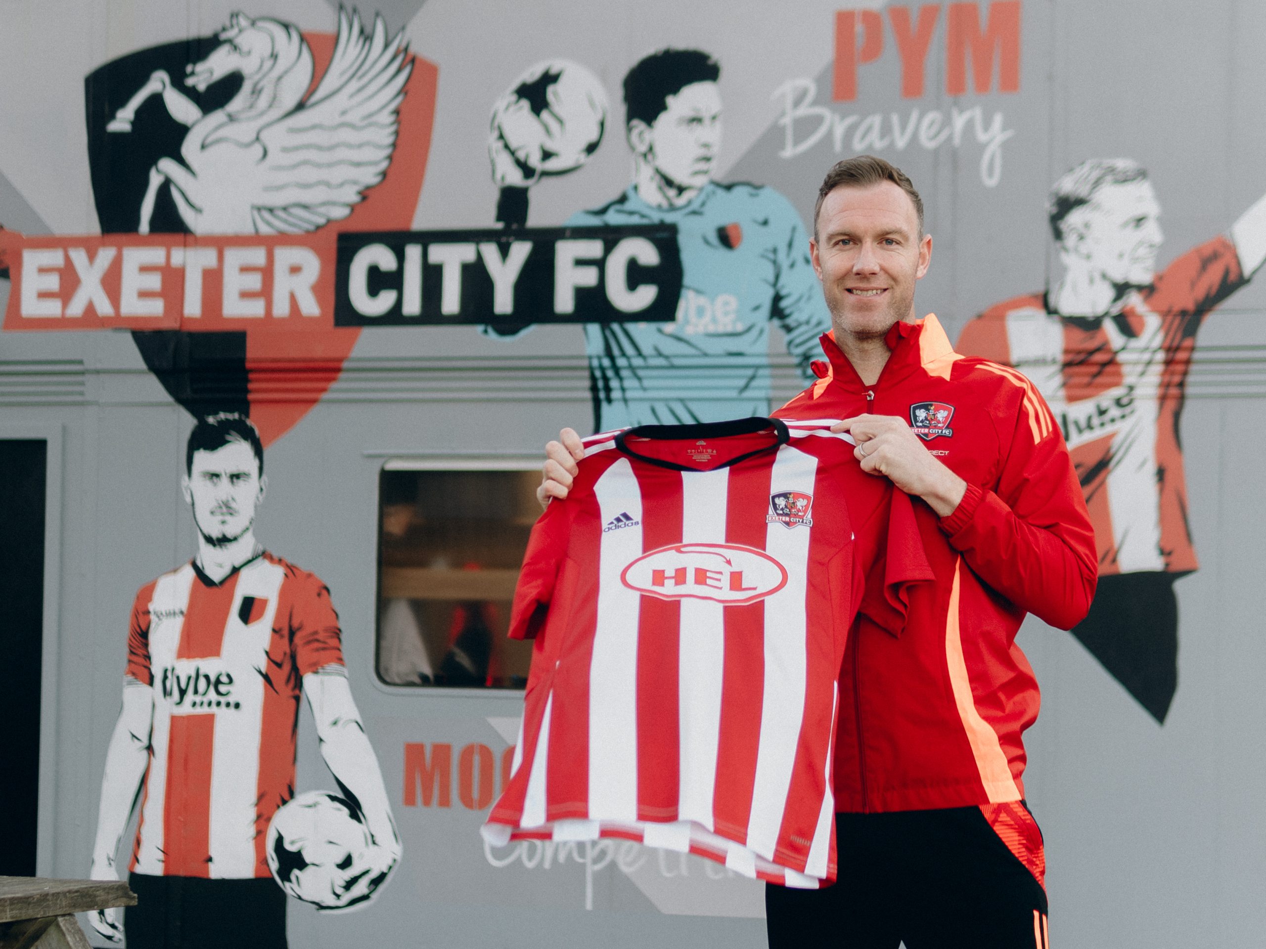 Exeter City Welcomes Back Veteran Midfielder McDonald